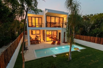 Beautiful 2-story home with 5 bedrooms, 6 bathrooms. Located in on Bahia Principe Riviera Maya Golf Course in  - for sale on GolfHomes.com, golf home, golf lot