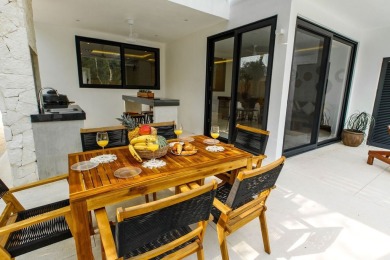 Beautiful 2-story home with 5 bedrooms, 6 bathrooms. Located in on Bahia Principe Riviera Maya Golf Course in  - for sale on GolfHomes.com, golf home, golf lot