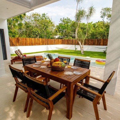 Beautiful 2-story home with 5 bedrooms, 6 bathrooms. Located in on Bahia Principe Riviera Maya Golf Course in  - for sale on GolfHomes.com, golf home, golf lot