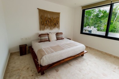 Beautiful 2-story home with 5 bedrooms, 6 bathrooms. Located in on Bahia Principe Riviera Maya Golf Course in  - for sale on GolfHomes.com, golf home, golf lot