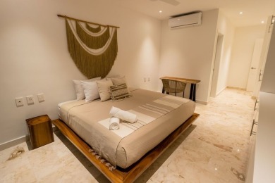 Beautiful 2-story home with 5 bedrooms, 6 bathrooms. Located in on Bahia Principe Riviera Maya Golf Course in  - for sale on GolfHomes.com, golf home, golf lot