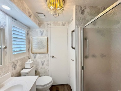 Charming 2BR/2BA coastal retreat in beautiful 55+ community on Indigo Creek Golf Club in South Carolina - for sale on GolfHomes.com, golf home, golf lot