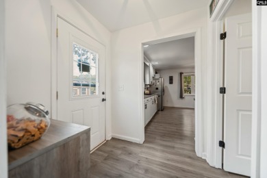 Welcome to your dream home! Nestled on a picturesque corner lot on Timberlake Country Club in South Carolina - for sale on GolfHomes.com, golf home, golf lot
