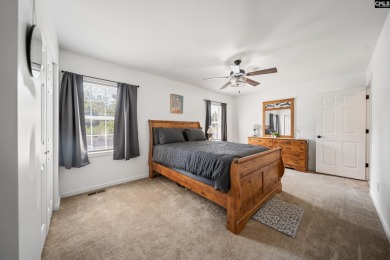 Welcome to your dream home! Nestled on a picturesque corner lot on Timberlake Country Club in South Carolina - for sale on GolfHomes.com, golf home, golf lot