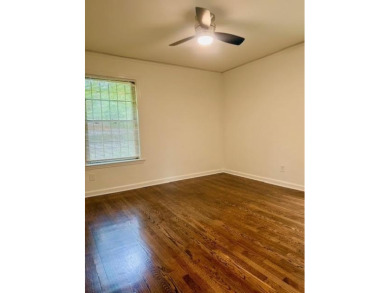 Welcome to this beautifully updated 4-bedroom, 2-bath brick home on Alfred Tup Holmes Golf Course in Georgia - for sale on GolfHomes.com, golf home, golf lot