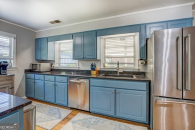 Comfort, Character, and Convenience. Welcome to 6129 Linwood on Indian Creek Golf Club in Georgia - for sale on GolfHomes.com, golf home, golf lot