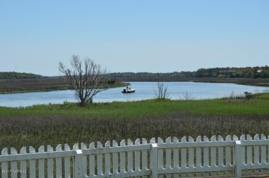 Great views. Golf course homesite overlooking the 2nd green on Bald Head Island Golf Club in North Carolina - for sale on GolfHomes.com, golf home, golf lot