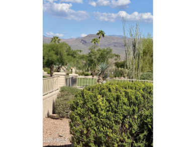 An executive home on golf course with fabulous mountain views on Rio Verde Country Club - Quail Run in Arizona - for sale on GolfHomes.com, golf home, golf lot
