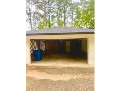 Welcome to this beautifully updated 4-bedroom, 2-bath brick home on Alfred Tup Holmes Golf Course in Georgia - for sale on GolfHomes.com, golf home, golf lot