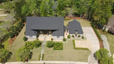 Stunning! Welcome to 1707 Candler Way, where timeless elegance on Moores Mill Golf Club in Alabama - for sale on GolfHomes.com, golf home, golf lot