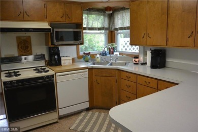 Take a look at this lake home across from Oakdale Country Club on Oakdale Country Club in Minnesota - for sale on GolfHomes.com, golf home, golf lot