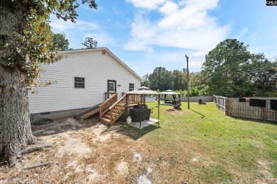 Welcome to your dream home! Nestled on a picturesque corner lot on Timberlake Country Club in South Carolina - for sale on GolfHomes.com, golf home, golf lot
