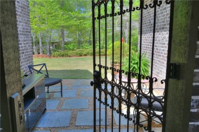 Stunning! Welcome to 1707 Candler Way, where timeless elegance on Moores Mill Golf Club in Alabama - for sale on GolfHomes.com, golf home, golf lot
