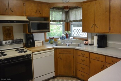 Take a look at this lake home across from Oakdale Country Club on Oakdale Country Club in Minnesota - for sale on GolfHomes.com, golf home, golf lot