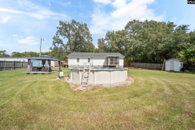 Welcome to your dream home! Nestled on a picturesque corner lot on Timberlake Country Club in South Carolina - for sale on GolfHomes.com, golf home, golf lot