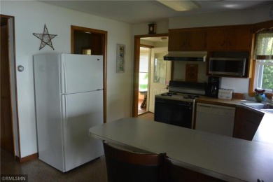 Take a look at this lake home across from Oakdale Country Club on Oakdale Country Club in Minnesota - for sale on GolfHomes.com, golf home, golf lot