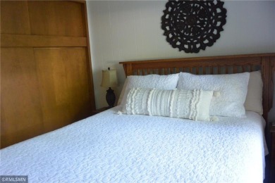 Take a look at this lake home across from Oakdale Country Club on Oakdale Country Club in Minnesota - for sale on GolfHomes.com, golf home, golf lot