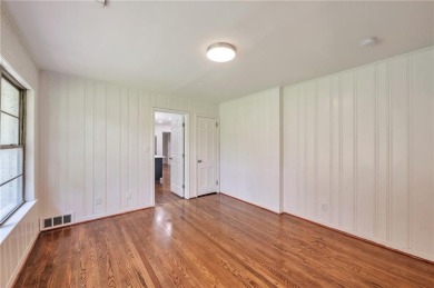 Welcome to this beautifully updated 4-bedroom, 2-bath brick home on Alfred Tup Holmes Golf Course in Georgia - for sale on GolfHomes.com, golf home, golf lot
