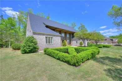 Stunning! Welcome to 1707 Candler Way, where timeless elegance on Moores Mill Golf Club in Alabama - for sale on GolfHomes.com, golf home, golf lot