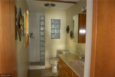 Take a look at this lake home across from Oakdale Country Club on Oakdale Country Club in Minnesota - for sale on GolfHomes.com, golf home, golf lot