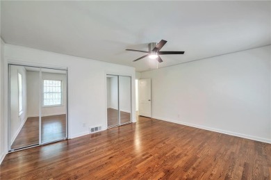 Welcome to this beautifully updated 4-bedroom, 2-bath brick home on Alfred Tup Holmes Golf Course in Georgia - for sale on GolfHomes.com, golf home, golf lot