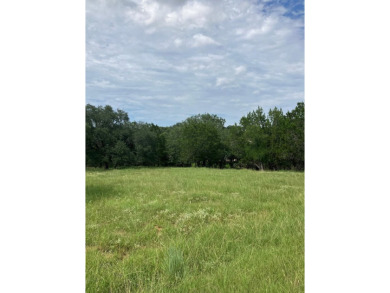 Oversized lot in Horseshoe Bay West, borders on a small wet on Ram Rock Golf Course in Texas - for sale on GolfHomes.com, golf home, golf lot