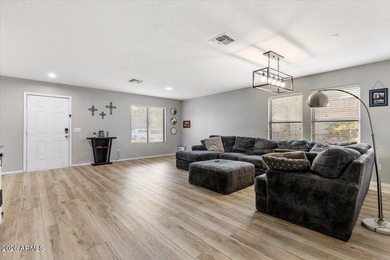 This stunning recently remodeled 5-bed, 3-bath home is a on Augusta Ranch Golf Club in Arizona - for sale on GolfHomes.com, golf home, golf lot