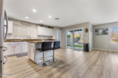 This stunning recently remodeled 5-bed, 3-bath home is a on Augusta Ranch Golf Club in Arizona - for sale on GolfHomes.com, golf home, golf lot