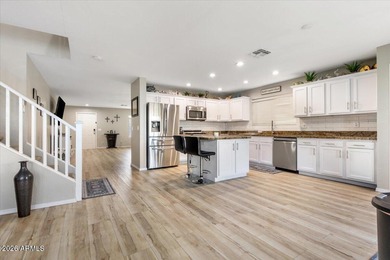 This stunning recently remodeled 5-bed, 3-bath home is a on Augusta Ranch Golf Club in Arizona - for sale on GolfHomes.com, golf home, golf lot