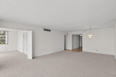 Rarely available 5th-floor corner residence at Palm Aire Country on  in Florida - for sale on GolfHomes.com, golf home, golf lot