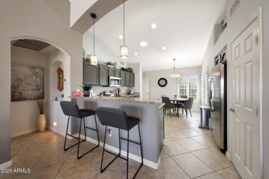 This beautifully updated Furnished extended Oakmont model is on Tuscany Falls At Pebble Creek in Arizona - for sale on GolfHomes.com, golf home, golf lot