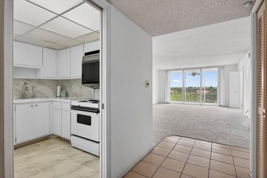 Rarely available 5th-floor corner residence at Palm Aire Country on  in Florida - for sale on GolfHomes.com, golf home, golf lot