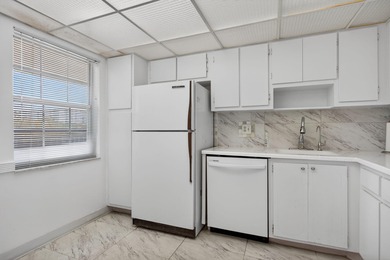 Rarely available 5th-floor corner residence at Palm Aire Country on  in Florida - for sale on GolfHomes.com, golf home, golf lot