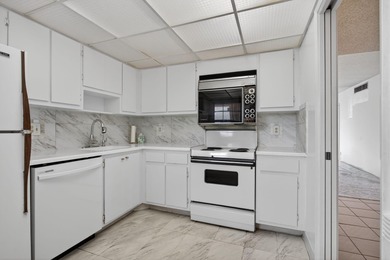 Rarely available 5th-floor corner residence at Palm Aire Country on  in Florida - for sale on GolfHomes.com, golf home, golf lot