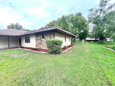 Welcome to your new home, perfectly situated near the esteemed on Inverness Golf and Country Club in Florida - for sale on GolfHomes.com, golf home, golf lot