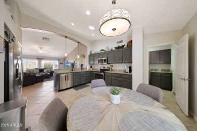This beautifully updated Furnished extended Oakmont model is on Tuscany Falls At Pebble Creek in Arizona - for sale on GolfHomes.com, golf home, golf lot