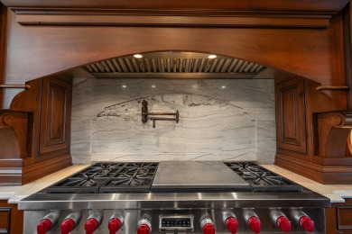 Welcome to this finely appointed custom Georgian home, offering on Sand Creek Golf and Country Club  in Indiana - for sale on GolfHomes.com, golf home, golf lot
