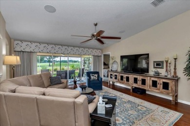 Step inside and be greeted by sweeping golf course views from on Summerglen Country Club in Florida - for sale on GolfHomes.com, golf home, golf lot