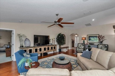 Step inside and be greeted by sweeping golf course views from on Summerglen Country Club in Florida - for sale on GolfHomes.com, golf home, golf lot