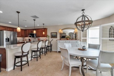 Step inside and be greeted by sweeping golf course views from on Summerglen Country Club in Florida - for sale on GolfHomes.com, golf home, golf lot