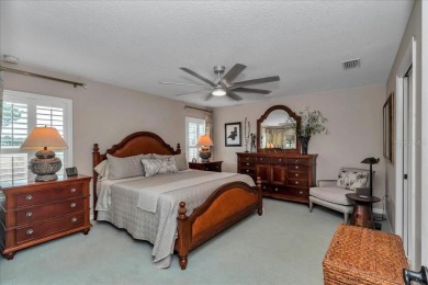 Step inside and be greeted by sweeping golf course views from on Summerglen Country Club in Florida - for sale on GolfHomes.com, golf home, golf lot
