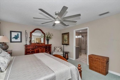 Step inside and be greeted by sweeping golf course views from on Summerglen Country Club in Florida - for sale on GolfHomes.com, golf home, golf lot