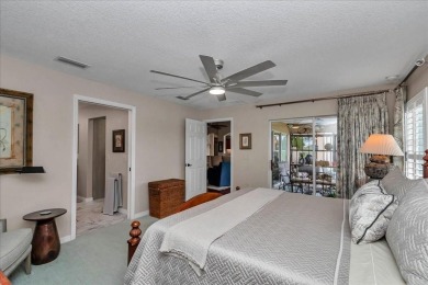 Step inside and be greeted by sweeping golf course views from on Summerglen Country Club in Florida - for sale on GolfHomes.com, golf home, golf lot