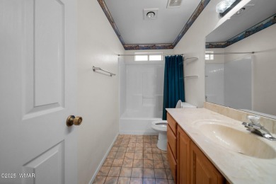 Charming 3-Bedroom, 2-Bath Home in Show Low Country Club Estates on Bison Golf and Country Club in Arizona - for sale on GolfHomes.com, golf home, golf lot