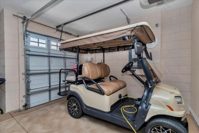 Step inside and be greeted by sweeping golf course views from on Summerglen Country Club in Florida - for sale on GolfHomes.com, golf home, golf lot