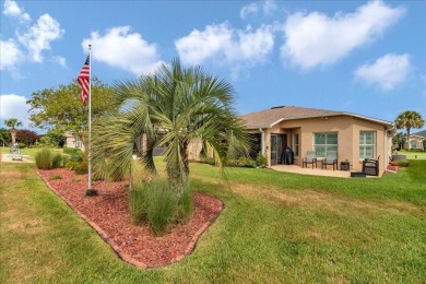 Step inside and be greeted by sweeping golf course views from on Summerglen Country Club in Florida - for sale on GolfHomes.com, golf home, golf lot