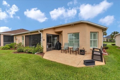 Step inside and be greeted by sweeping golf course views from on Summerglen Country Club in Florida - for sale on GolfHomes.com, golf home, golf lot