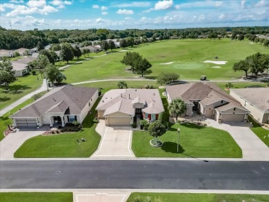 Step inside and be greeted by sweeping golf course views from on Summerglen Country Club in Florida - for sale on GolfHomes.com, golf home, golf lot