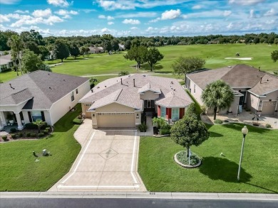 Step inside and be greeted by sweeping golf course views from on Summerglen Country Club in Florida - for sale on GolfHomes.com, golf home, golf lot