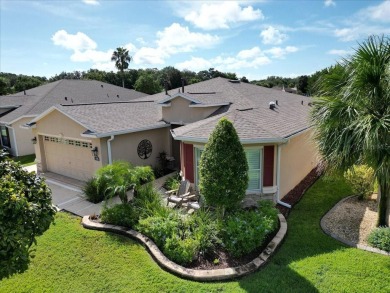 Step inside and be greeted by sweeping golf course views from on Summerglen Country Club in Florida - for sale on GolfHomes.com, golf home, golf lot